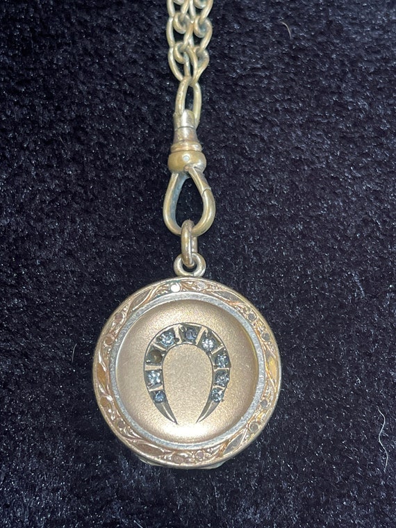 Antique horseshoe locket on watch chain