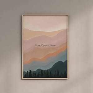 Op de afbeelding: Een ingelijste print met een minimalistisch landschapsontwerp. De print toont een gelaagde bergketen in tinten roze, oranje en blauw, met een rij donkergroene bomen aan de voet. De tekst "Your Quote Here" staat gecentreerd op de print.