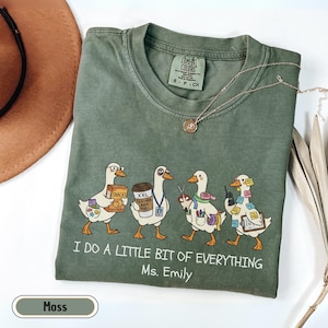 Personalized paraprofessional Comfort Colors shirt featuring funny goose characters carrying school supplies, coffee, snacks, and classroom essentials with custom teacher name, perfect gift for teacher aides, paraeducators, SPED staff, and RBTs.