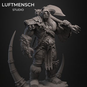 May include: A gray 3D printed model of an Orc warrior holding a large axe. The Orc is wearing armor and has a long beard. The model is standing on a rocky base.