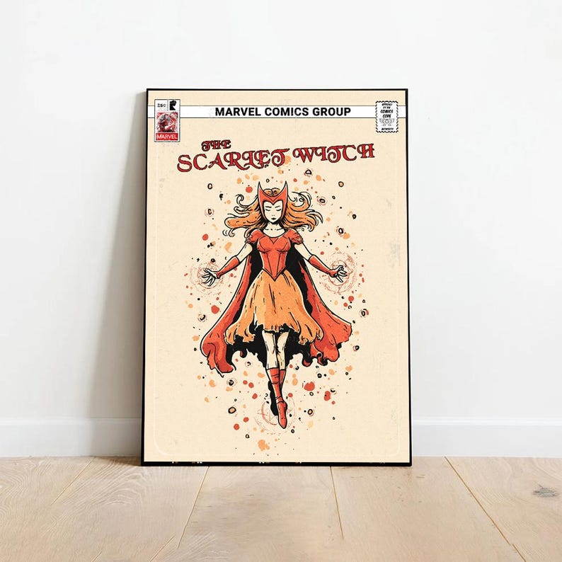 Op de afbeelding: Een ingelijste stripboekcover met "The Scarlet Witch" van Marvel Comics. De illustratie toont een rood gekleed personage met wapperend haar, omringd door energie-effecten. De achtergrond is beige met verspreide stippen.