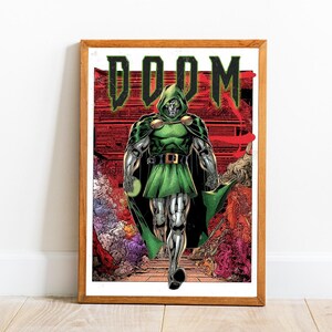 May include: Framed print featuring a comic book illustration of Doctor Doom. The character is depicted in a green hooded cloak and metallic armor, striding forward. The word "DOOM" is displayed in green block letters above the character.