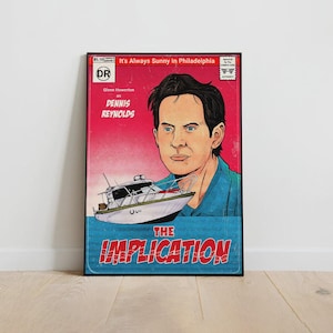 May include: A framed poster with a comic book style design. The poster features a portrait of a man, a boat, and the text "It's Always Sunny in Philadelphia" and "The Implication". The color scheme includes red, blue, and white.