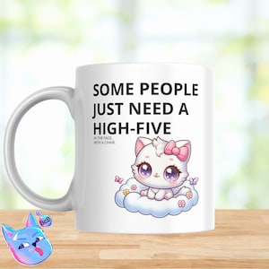 May include: White ceramic coffee mug with a black and white illustration of a cat with pink bow on a cloud. The text on the mug reads "Some people just need a high-five in the face. With a chair."