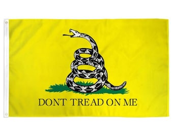 May include: A yellow flag with a coiled rattlesnake and the words "Don't Tread On Me".