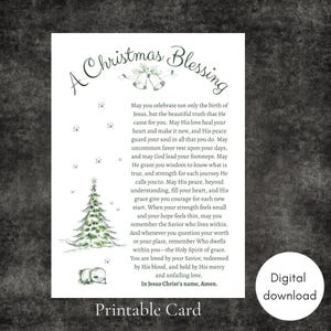 May include: A white rectangular card featuring the text A Christmas Blessing at the top, followed by a religious message. The design includes a green illustration of two bells, a Christmas tree, and a small snowman, with falling snowflakes.