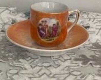 A Vintage Miniature Hand Painted Orange Cup And Saucer  Porcelain German