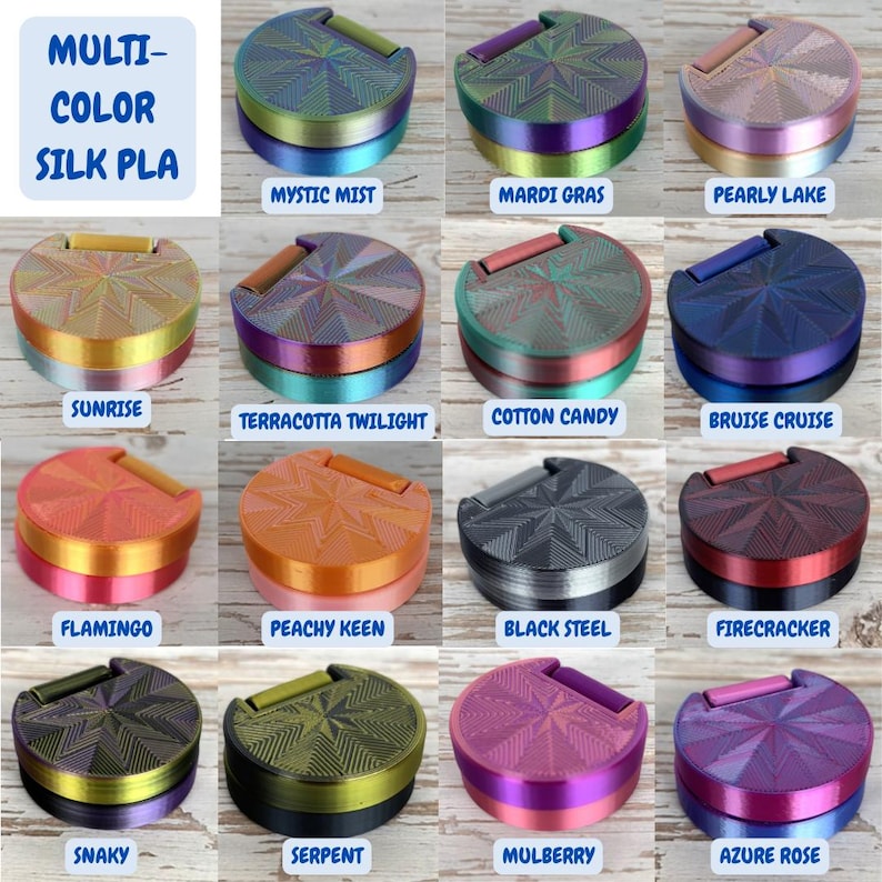 May include: A collection of multi-color silk PLA products, each with a unique color scheme and starburst pattern. The products include shades like Mystic Mist, Mardi Gras, Pearly Lake, Sunrise, Terracotta Twilight, Cotton Candy, Bruise Cruise, Flamingo, Peachy Keen, Black Steel, Firecracker, Snaky, Serpent, Mulberry, and Azure Rose.