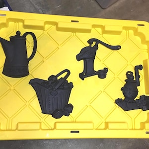 Vintage Sexton SET of 4 Cast Metal Wall Decor. Pot Belly Wood Stove, Coffee Pot, Water Pump, Coal Bucket. Fantastic Condition.