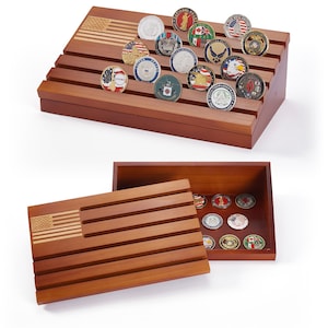 May include: A wooden display case with an American flag design, holding various collectible coins. The case is made of dark wood and has multiple tiered levels to showcase the coins. The coins feature different emblems and designs.