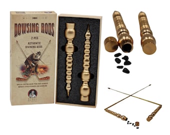 May include: A set of gold-colored dowsing rods and accessories. The image includes two rods in a box, two cylindrical rods, and two L-shaped rods. The box reads "DOWSING RODS" and "AUTHENTIC DIVINING RODS".