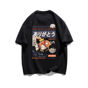 a black t - shirt with a cartoon character on it