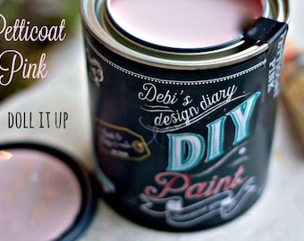 May include: A can of pink paint labeled "Petticoat Pink" with the text "Debi's design diary DIY Paint" on the label.