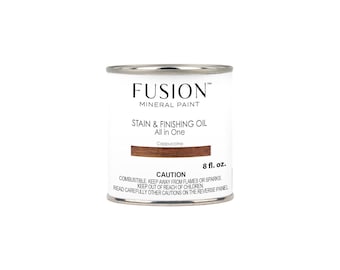 May include: A can of Fusion Mineral Paint Stain & Finishing Oil in the color Cappuccino. The can is 8 fluid ounces and has a caution label.