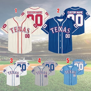 May include: Baseball jerseys in cream, blue, white, gray, and light blue, each with the word "TEXAS" and the number "00" on the front. The jerseys also feature a custom name and number on the back.