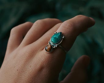 925 zilveren ring met tijgeroog en Tibetaans turkoois.