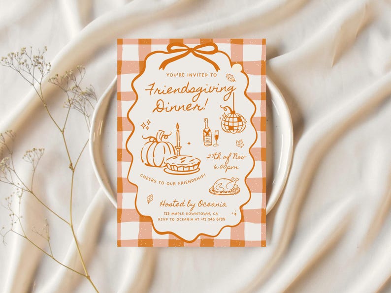 May include: A rectangular Friendsgiving dinner invitation card featuring an orange and white gingham background. The center has a scalloped frame with a bow, containing line art of a pumpkin, pie, bottle, disco ball, and turkey with text.