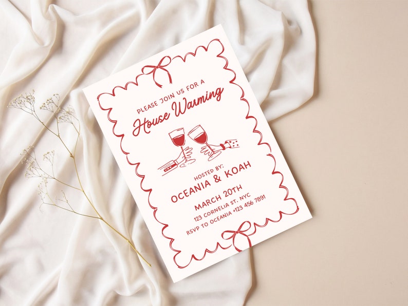 May include: A red and white housewarming invitation with a decorative border. The invitation features a hand-drawn illustration of two people toasting with wine glasses. The text reads "Please join us for a House Warming Hosted by: Oceania & Koah March 20th 123 Cornelia St. NYC RSVP to Oceania +123 456 7891"