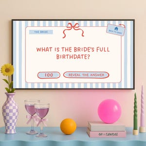 May include: A television screen displaying a game for a bridal shower. The screen shows a question asking for the bride's full birthdate. The question is followed by two buttons: "100" and "Reveal the Answer".