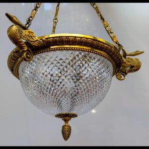 Lucien  Gau Crystal and Bronze Empire Chandelier… in excellent condition. rare find .