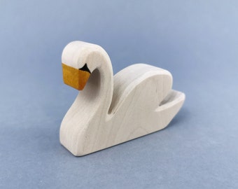 A wooden toy figurine depicting a white Swan, Waldorf figurine toy made entirely of wood, gift for child