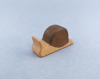 Wooden toy Snail figurine with brown shell
