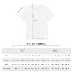 A size chart for t-shirts, showing imperial and metric measurements for width, length, and sleeve length.