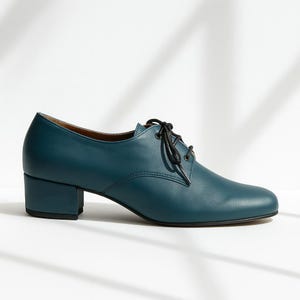 Side view of teal leather Oxfords showing genuine leather texture and elegant 3cm heel.