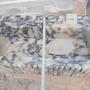 Beautiful view of Ultra-High-End Marble Home Sink Designs