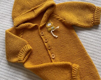 Soft and Snug: Introducing Our Mustard-Colored Hooded Jumpsuit - Perfect for Newborns, Ideal for Hospital Homecomings, Complete with Knitted