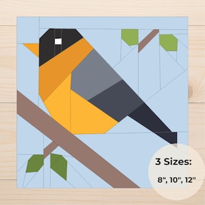 May include: A geometric bird design in orange, grey, black, and blue, perched on a brown branch. The design is set against a light blue background. Text in a white circle indicates three size options: 20 cm, 25 cm, and 30 cm.