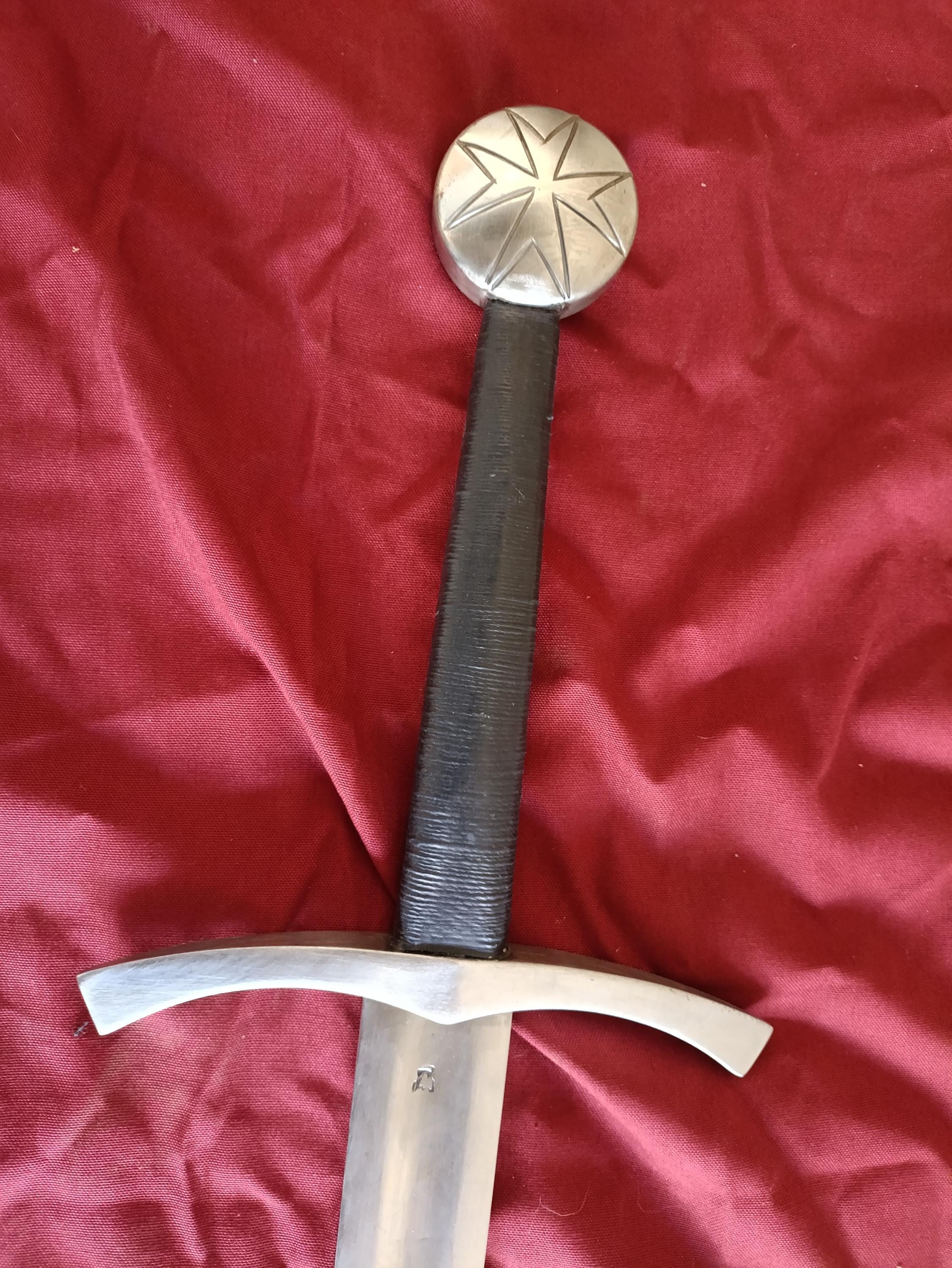 One Hand and an Half Sword with a Malta's cross Engraved