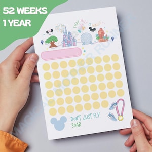 May include: A printable 52-week challenge tracker with a Disney theme. The tracker features a grid of 52 yellow circles, a Mickey Mouse head, and the text "Don't just fly. Soar."
