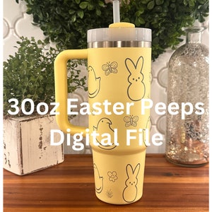May include: A yellow 30oz tumbler with a handle, straw, and lid. The tumbler is decorated with black line drawings of Easter Peeps, butterflies, and flowers. Text on the tumbler reads "30oz Easter Peeps Digital File."