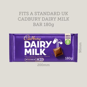 May include: A Cadbury Dairy Milk chocolate bar in a purple wrapper. The bar is 200mm long and 90mm wide, and weighs 180g. The packaging includes the text "Cadbury Dairy Milk" and "The Classic Creamy Taste."