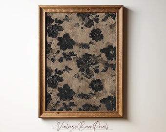 May include: A framed print with a vintage floral pattern on a burlap background. The flowers are black and the background is a light brown. The frame is a dark brown wood.