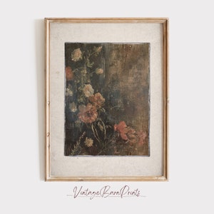 May include: A framed vintage print of a floral still life painting. The painting features a bouquet of pink, white, and yellow flowers with green leaves against a dark brown background.