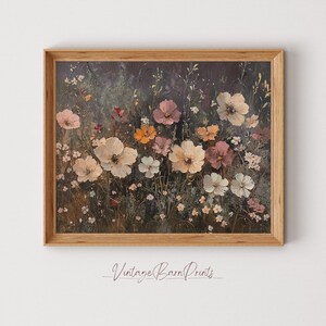 May include: A framed painting of a field of wildflowers in shades of pink, white, and yellow. The flowers are painted in a realistic style and are set against a dark green background.