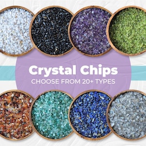 May include: An image showcasing eight wooden bowls filled with various crystal chips. The crystals are in shades of white, black, purple, green, orange, teal, blue, and gray. Text in the image reads "Crystal Chips, Choose From 20+ Types."