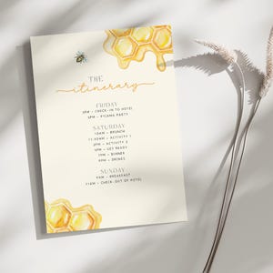 May include: A yellow and white printable itinerary for a weekend getaway with a honeybee and honeycomb design. The itinerary includes activities for Friday, Saturday, and Sunday.