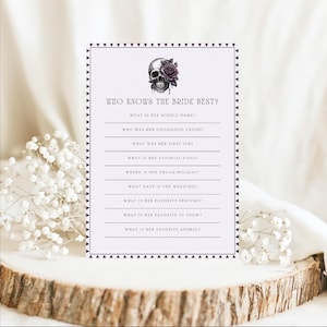May include: A printable game card with a skull and rose illustration. The text "Who Knows the Bride Best?" is at the top of the card. The card has a list of questions about the bride, such as "What is her middle name?" and "What is her favorite food?"