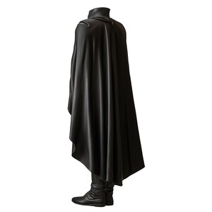 May include: A black cape and matching boots. The cape has a high collar and drapes down to the ankles. The boots are also black and appear to be made of leather. The outfit is designed for costume or cosplay.