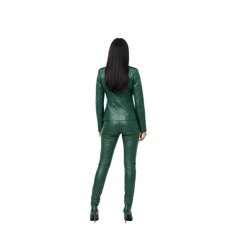 May include: A green leather jacket and matching pants set. The jacket has a tailored fit with a collar and button details. The pants are form-fitting. The outfit is a solid, vibrant green color.