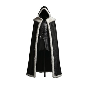 May include: A black hooded cloak with a white fur trim. The cloak is long and flowing, and it has a high collar.