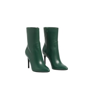 May include: A pair of emerald green ankle boots with stiletto heels. The boots have a pointed toe and a zipper closure on the side. The boots are made of a smooth, shiny material.