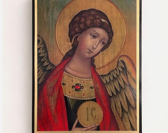 May include: A rectangular religious icon painting featuring an angel with brown curly hair, large wings, and a red robe. The figure holds a circular gold disc marked with the letters IC, set against a gold halo and a dark green background.