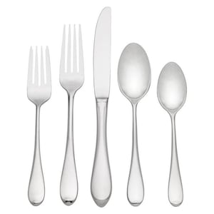 May include: A set of five silver-toned flatware pieces, including a knife, fork, and two spoons. The pieces have a simple, elegant design with rounded handles.
