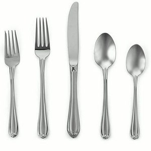 May include: A set of five silver-toned flatware pieces, including a knife, fork, and spoon. The pieces have a classic design with a rounded handle.