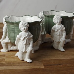 Antique Pair Small Planters Green and White Porcelain Kneeling Cherub Figurines