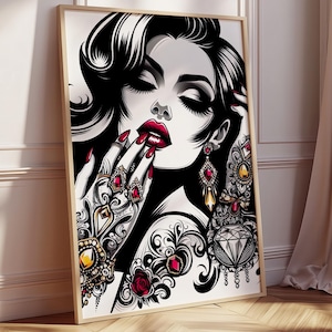May include: A framed art print depicting a stylized illustration of a woman with black hair, red lips, and elaborate jewellery. The artwork is in black, white, and red, with detailed patterns on the hands and shoulders. The print is on a wooden floor.